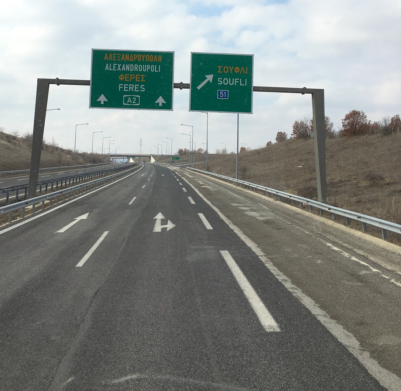 Road sign in Greece indicating the direction to Alexandroupolis.