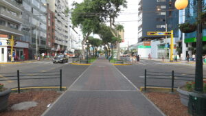 Must-see Places in Lima - A bustling street intersection and central pedestrian path in the Miraflores district of Lima, Peru.