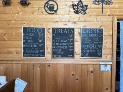 Menu board displaying food options at the Huble Homestead