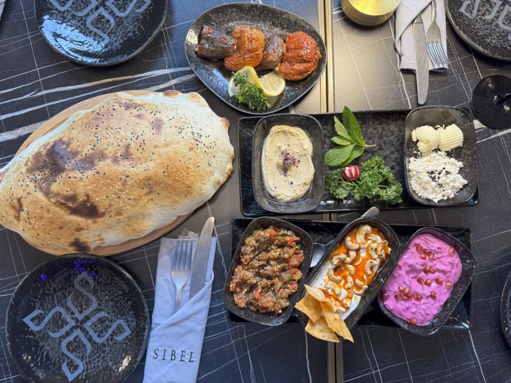 A variety of elegantly plated appetizers arranged on the table.