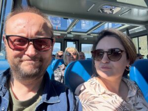 A couple takes a selfie inside the Maligne Lake tour boat.