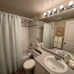 Clean and modern bathroom at Times Square Suites Hotel Vancouver.