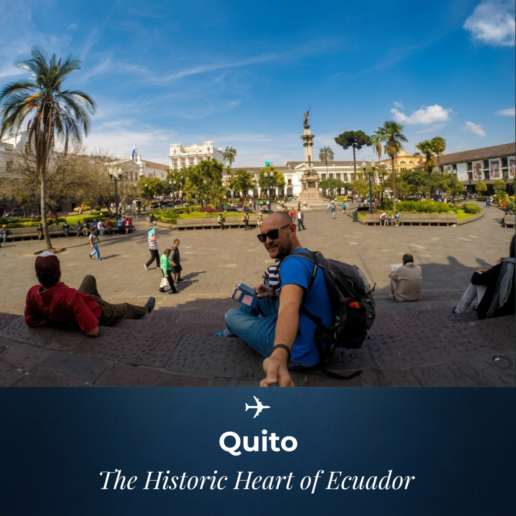 Quito Guide - A wide-angle selfie of a traveler with a backpack sitting on the steps overlooking the historic Plaza Grande (Independence Square) in Quito, Ecuador, featuring the Independence Monument and colonial buildings in the background.