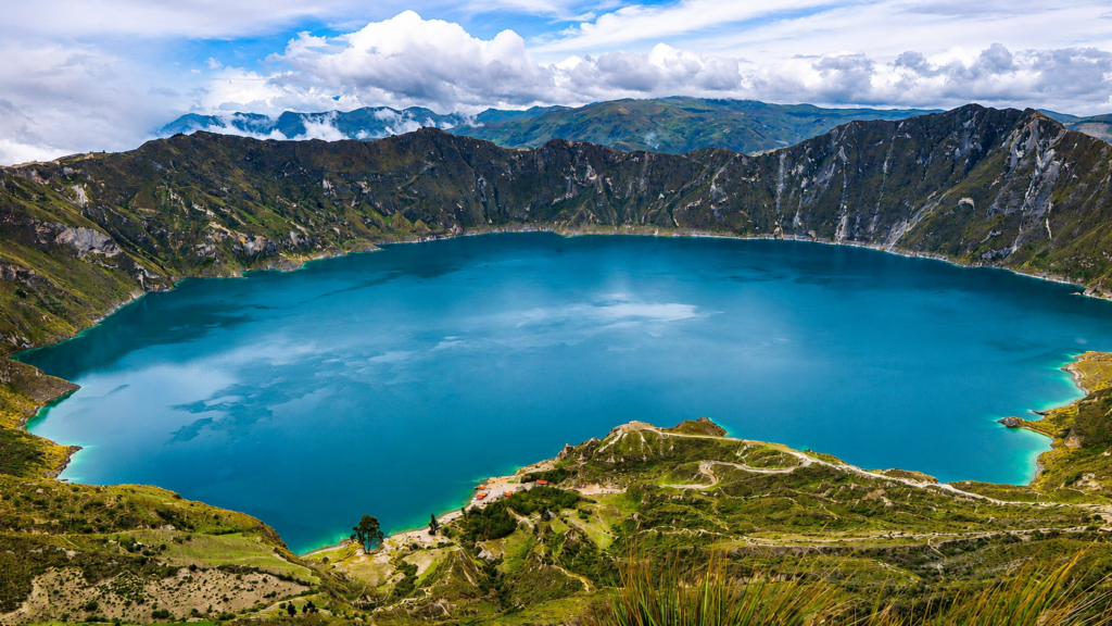 Ecuador Laguna de Quilotoa Viewpoint 2 Panoramic view of Laguna de Quilotoa crater lake and the surrounding Andes Mountains from the viewpoint in Ecuador.