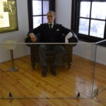 Wax figure of Mustafa Kemal Atatürk sitting in an armchair inside the Atatürk Museum in Thessaloniki