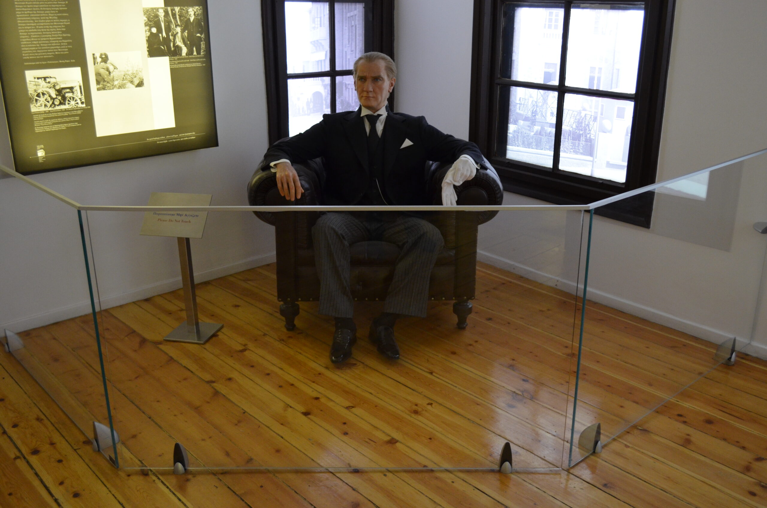 Wax figure of Mustafa Kemal Atatürk sitting in an armchair inside the Atatürk Museum in Thessaloniki