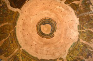 Interior dome of the Rotunda in Thessaloniki with Byzantine mosaic fragments and exposed brickwork