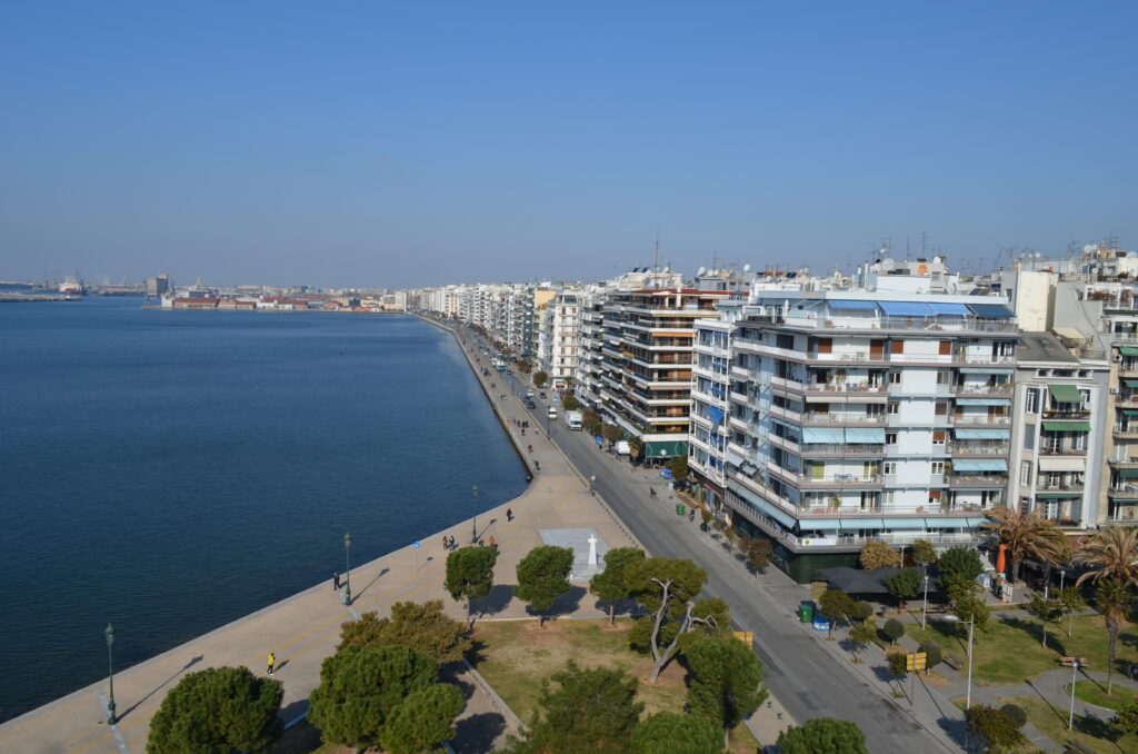 Panoramic view of the Thessaloniki waterfront and coastal buildings from the top of the White Tower.