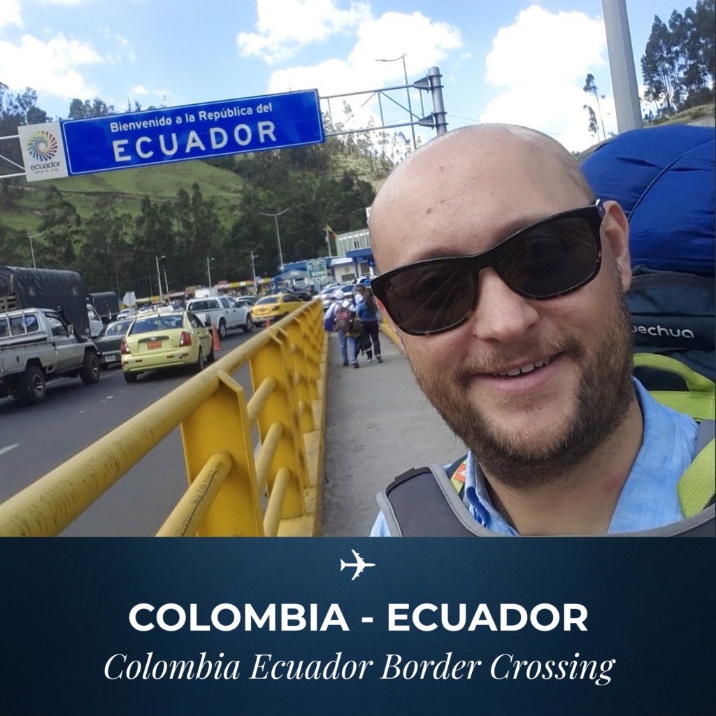 A backpacker taking a selfie during the Colombia Ecuador border crossing at Rumichaca Bridge, with an Ecuador welcome sign in the background.